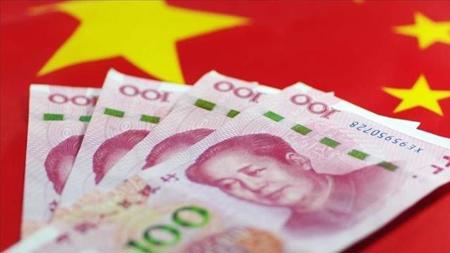 اليوان الصيني يهبط إلى أدنى مستوياته أمام الدولار منذ 14 عامًا